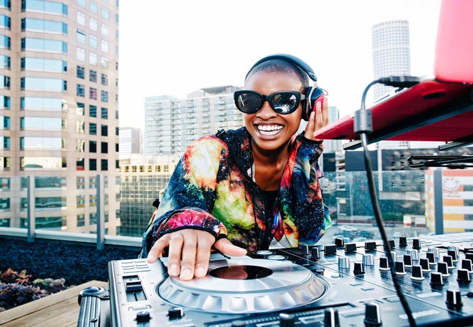 DJ performing outdoors at a city event
