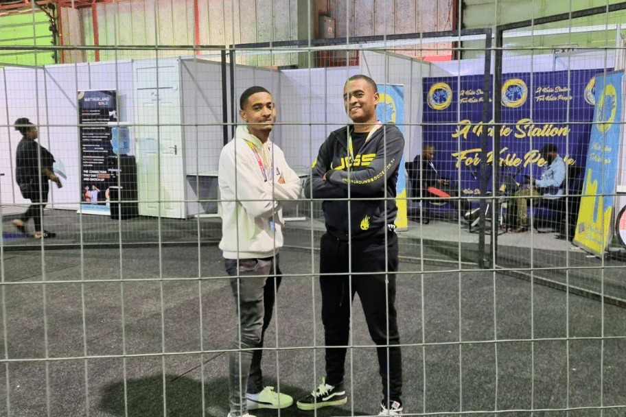 Underground Soccer (UGS) stand with visitors